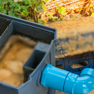 Why should I use enzyme cleaners in my grease trap?